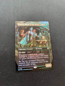 Lathril, Blade of the Elves (Borderless) Foundations Foil - Image 1