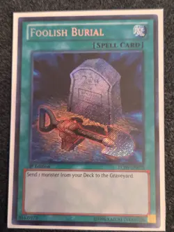 Yugioh Foolish Burial LCJW-EN070 1st Edition Secret Rare Joeys World LP - Image 1