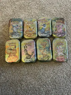 Pokemon TCG Scarlet & Violet Prismatic Evolutions Mini Tins Sealed full set New - Image 1