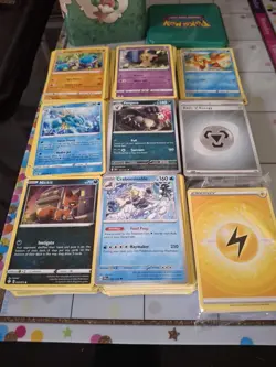 Over 300 pokemon cards Common To Rare Plus 2 Unopened Energy Packs And Meal Tin - Image 1