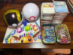 Pokemon Lot!! 2 Empty PokeBalls, Poster, 2 Empty Eevee Tins And Over 500 Cards - Image 1