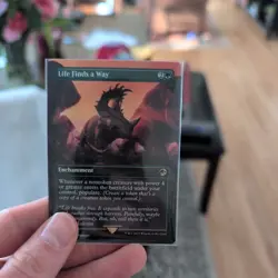 MTG: Life Finds a Way (Borderless) (LP): Jurassic World - Image 1