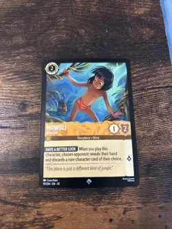 Disney Lorcana Whispers in the Well - Mowgli - Man Cub - Regular #19 - Image 1