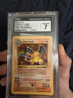 Pokemon 1999 Charizard Base Set Shadowless Holo Rare 4/102 CGC 7 NM - Image 1