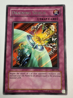 Yu-Gi-Oh! DRAINING SHIELD - AST-054 - RARE - VLP - Image 1