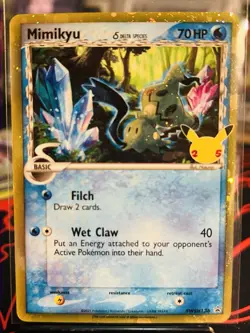 Pokemon Card TCG - Mimikyu Delta Species SWSH136 Promo Celebrations - Image 1