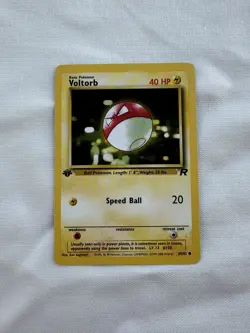 Pokemon 2000 Voltorb Team Rocket 1st Edition NM-MINT Wizards of the Coast 69/82 - Image 1