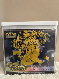 Surging Sparks Pokemon Center ETB Factory Sealed with Protective Case - Image 1