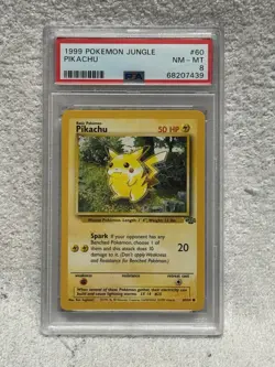 Pokemon 1999 JUNGLE #60 PIKACHU PSA 8 - Image 1