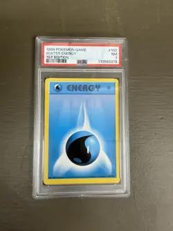 1999 POKEMON BASE SET 1ST EDITION #102 WATER ENERGY PSA 7 Graded card slab - Image 1