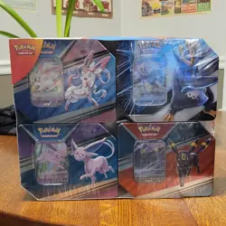 Costco Pokemon TCG V Heroes 4 Tin Box Set – Contains Evolving Skies! - Image 1