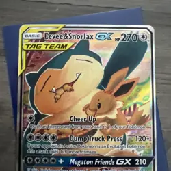 Pokemon Eevee & Snorlax GX Team Up TCG SM169 Holo Black Star Promo - Image 2