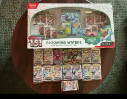 Pokemon TCG - 151 Blooming Waters - Prismatic Evolutions x12 - Evolving Skies x1 - Image 1