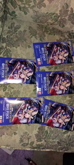 7 total One Piece booster packs 5 Op-14 Booster Pack 2 Op-12 One Piece packs - Image 1