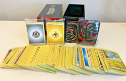 Lot of Pokemon TCG SEALED Energy Packs, 316 Loose Cards, & Card Covers in Box - Image 1