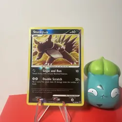 Stunky 76/100 Stormfront Common Pokemon Card reverse holo - Image 1