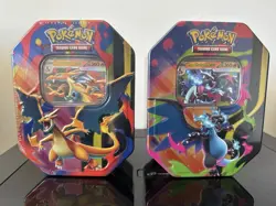 Pokemon Mega Charizard X and Y Set of 2 Tins - BRAND NEW IN HAND - Image 1