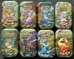 Pokemon Prismatic Evolutions Mini Tins (Complete Set of 8) - SEALED - Image 1