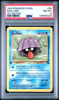 1999 POKEMON FOSSIL 1ST ED #54 SHELLDER PSA 8 - Image 1