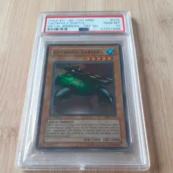 2002 Yu-Gi-Oh! MRD-075 1st Edition Catapult Turtle NA English PSA 10 GEM MINT - Image 1