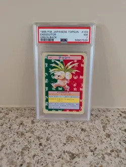 1997 POKEMON JAPANESE TOPSUN GREEN BACK #103 EXEGGUTOR PSA 7 - Image 1