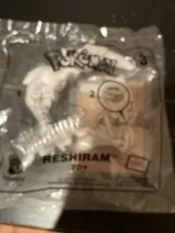 McDonalds Pikachu Holo Promo 2018 Pokemon Card Still Sealed With Reshiram Toy - Image 1