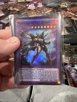 3x Masked HERO Atomic 1st Edition Super Rare MZMU-EN016 Yu-Gi-Oh! - Image 1