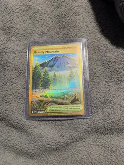 Gravity Mountain 250/191 Surging Sparks Pokemon English Gold Hyper Rare 2024 - Image 1