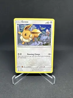 Pokemon TCG Eevee SM235 Sun & Moon Black Star Promos Cosmos Holo NM Card - Image 1