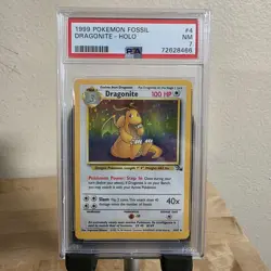 Pokemon Dragonite 4/62 1999 Fossil Holo PSA 7 NM - Image 1