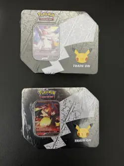 Pokemon TCG Celebrations 25th Charizard V and Sylveon V Big Tin pair Sealed - Image 1