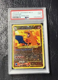 PSA 9 2000 P.M. CHARIZARD 006 NEO 2 PROMO REVERSE FOIL HOLO POKEMON CARD SLAB - Image 1