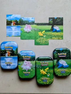 FREE PIKACHU POKECOIN TCG GO MINI TIN SET OF 4 ART CARD AND CASE ONLY Very Nice - Image 1