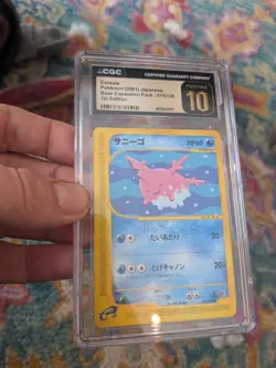(POP 11) CGC 10 PRISTINE Pokemon Corsola 015/128 1st Edition Japanese Expedition - Image 1