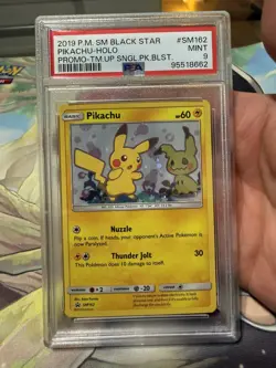 2019 POKEMON BLACK STAR PIKACHU HOLO PROMO TEAM UP SM162 PSA 9 MINT - Image 1