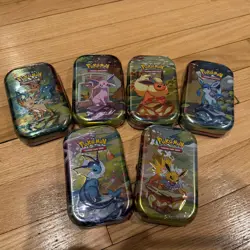 7x Pokemon Prismatic Evolutions Mini Tins Sealed New (LOT OF 6) - Image 1