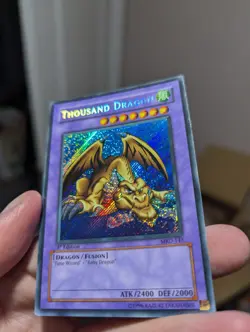 Yugioh Thousand Dragon MRD-143 Secret Rare 1st Edition AE - Image 1