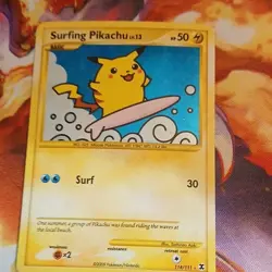 Pokemon Surfing Pikachu Secret Rare Holo Card 114/111 2009 - Image 1