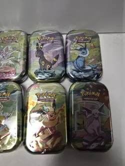 Pokemon TCG Prismatic Evolutions Mini Tin Complete Set 8 Sealed SHIPS TODAY - Image 3