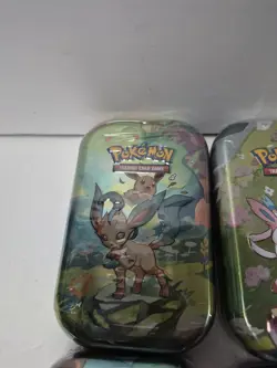 Pokemon TCG Prismatic Evolutions Mini Tin Complete Set 8 Sealed SHIPS TODAY - Image 4