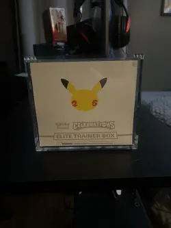 Pokemon TCG: 25th Anniversary Celebrations Elite Trainer Box With Acrylic Case 820650809439 - Image 1