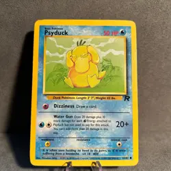 Psyduck 65/82 Team Rocket Pokemon MP - Image 1