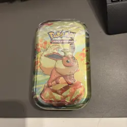 Pokemon Prismatic Evolutions Mini Tin - Flareon - Sealed - 2 x Prismatic Packs - Image 1