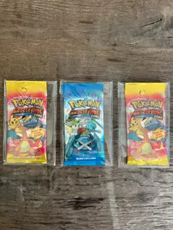 3x *RARE* 2011 Sealed Pokemon Booster Pack Battle Disc Game Charizard from box - Image 1