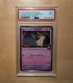 2025 POKEMON DRI EN-DESTINED RIVALS PRERELEASE-STAFF TEAM ROCKET'S MIMIKYU PSA 9 - Image 1