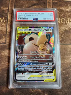 2019 POKEMON SUN & MOON TEAM UP #120 EEVEE & SNORLAX GX PSA 7 - Image 1