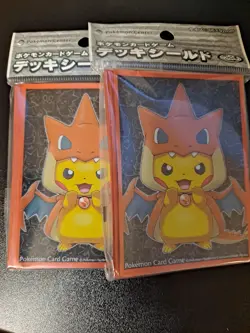 Pokemon Poncho Pikachu Mega Charizard Card Sleeves 2 packs (32 each) New/Sealed - Image 1