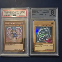 YuGiOh Blue-Eyes White Dragon + Dark Magician girl graded 8 and 6 1st editions - Image 1
