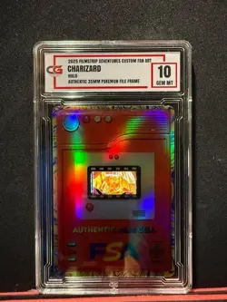 🔥CHARIZARD 35MM RARE FILM FRAME CELL FROM POKEMON THE MOVIE 2000 CG 10 🔥 - Image 1