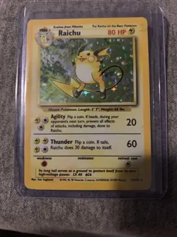 Pokemon Base Set Raichu 14/102 Holo Rare 1999 Wizards of the Coast Vintage Card - Image 1